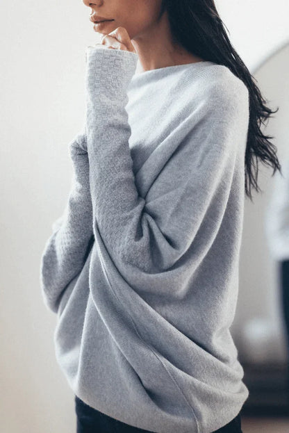 Women's knit sweater with off-shoulder long-sleeve draped fit