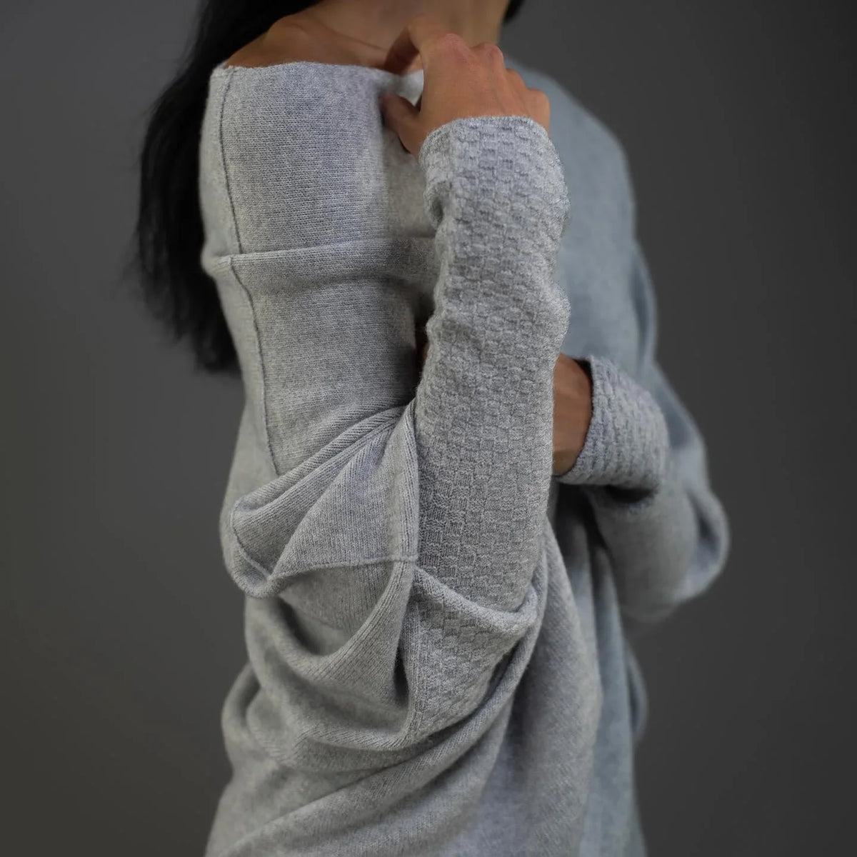 Women's knit sweater with off-shoulder long-sleeve draped fit