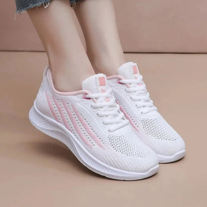 Women's knit athletic running sneakers with lace-up striped design