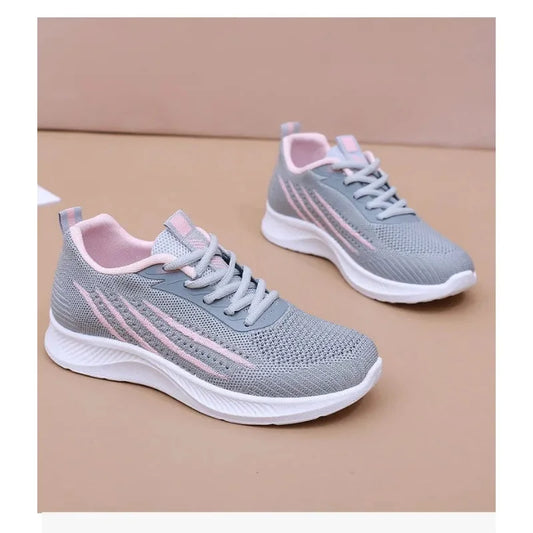 Women's knit athletic running sneakers with lace-up striped design