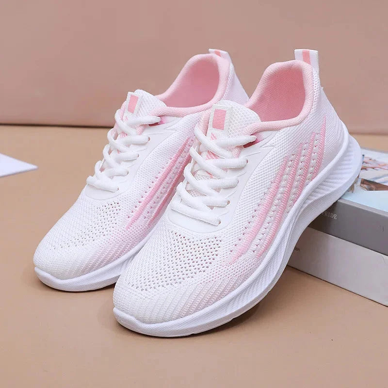 Women's knit athletic running sneakers with lace-up striped design – White