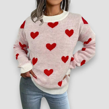 Women's heart print long-sleeve knit sweater with crew neck and ribbed cuffs