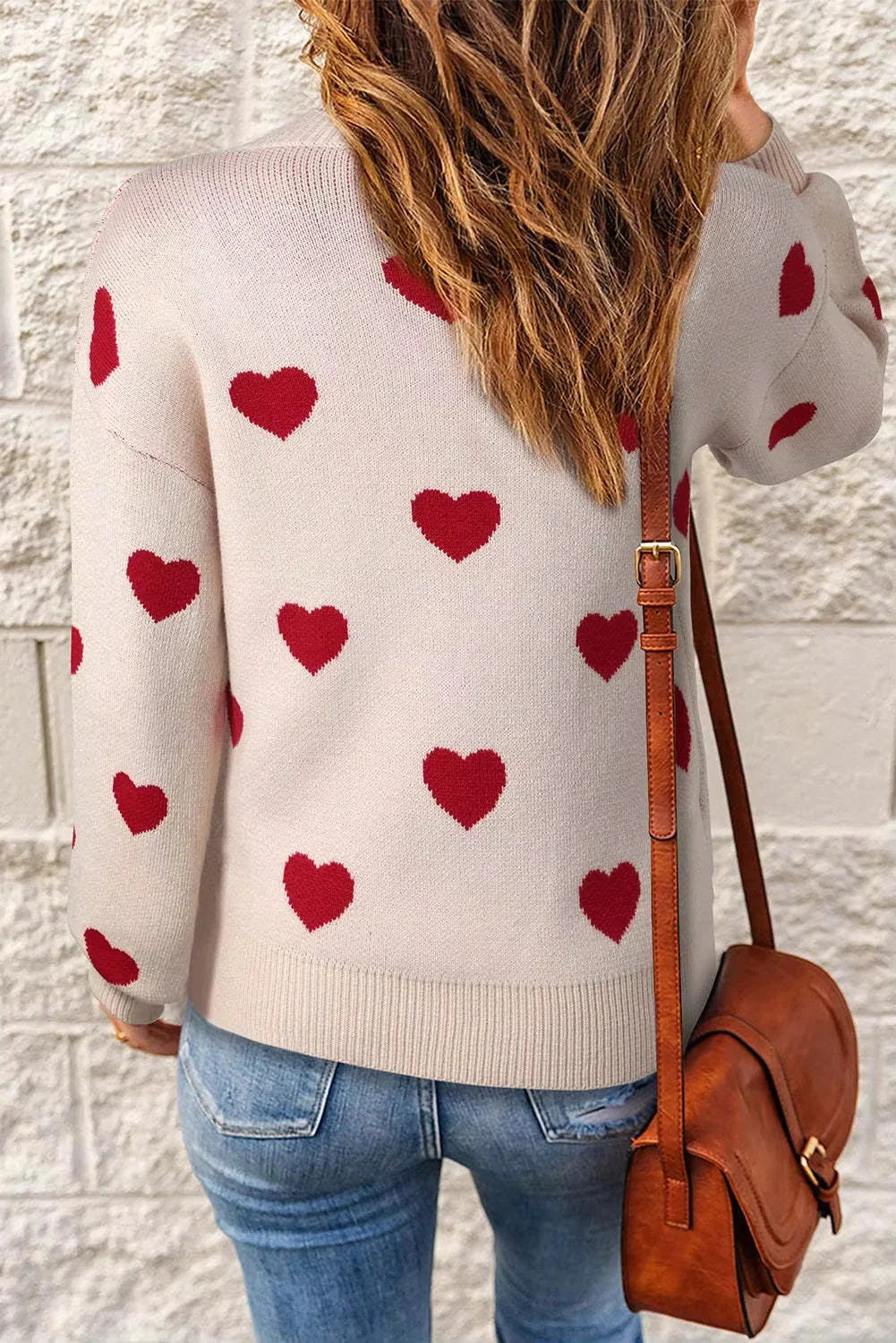 Women's heart print long-sleeve knit sweater with crew neck and ribbed cuffs