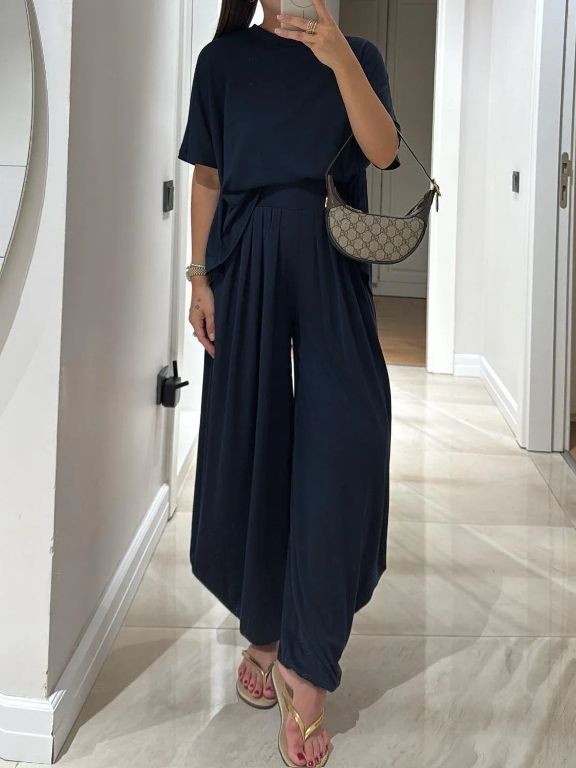 Women's jersey casual two-piece set with wide-leg pleated pants and a crewneck top