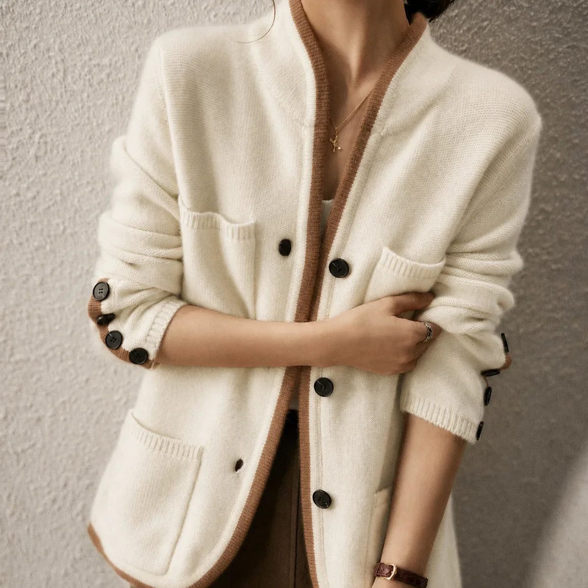 Women's knit button-front cardigan sweater with contrast trim and cuff buttons
