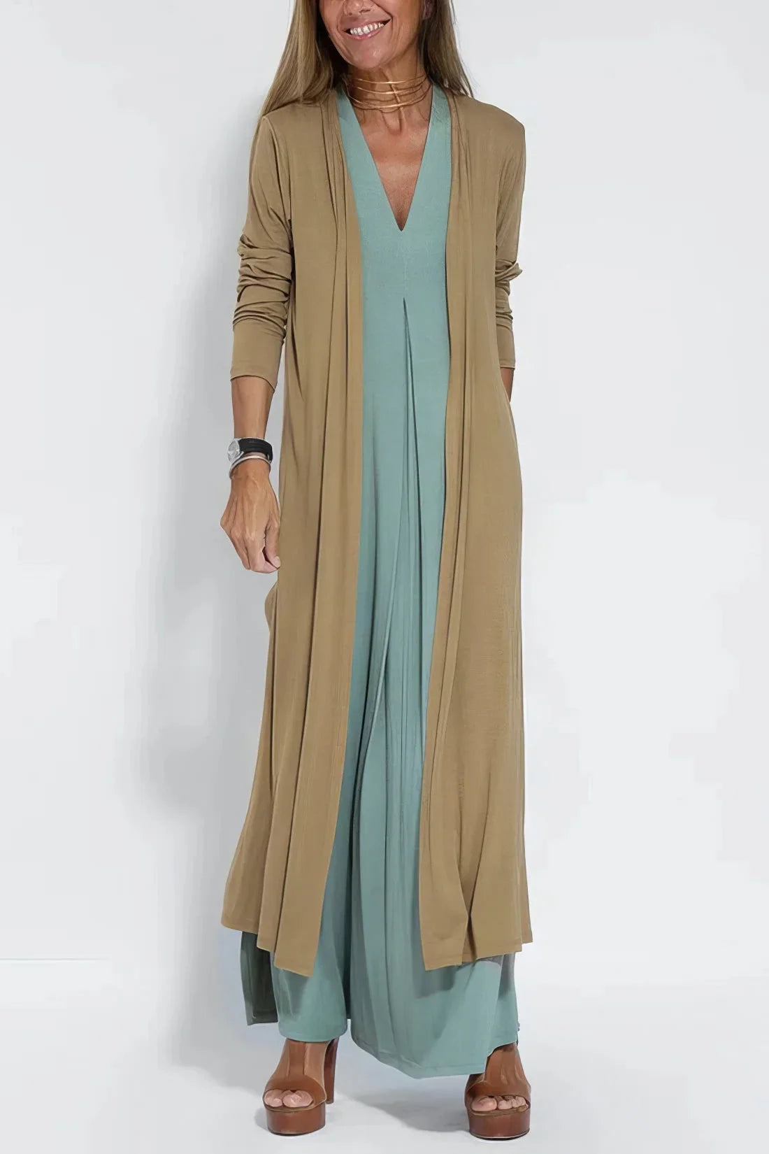Women's knit flowy maxi dress with sleeveless V-neck and draped front