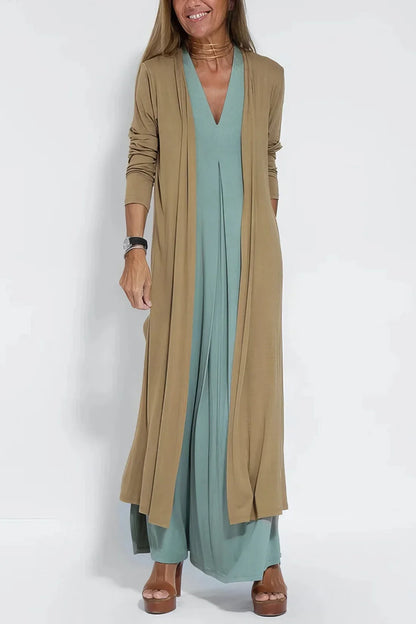 Women's knit flowy maxi dress with sleeveless V-neck and draped front