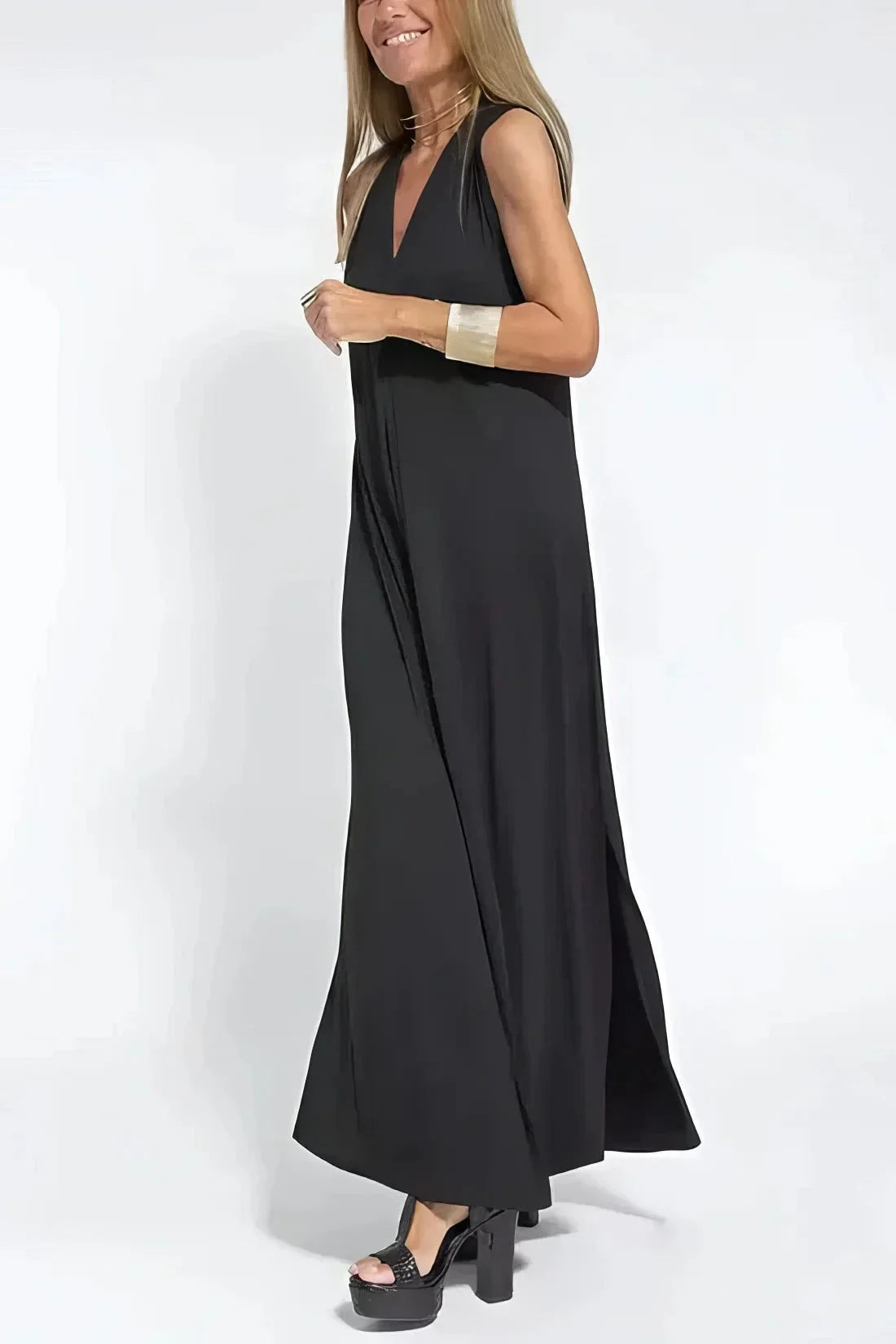 Women's knit flowy maxi dress with sleeveless V-neck and draped front