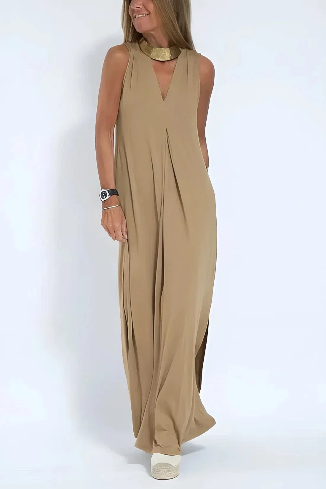 Women's knit flowy maxi dress with sleeveless V-neck and draped front