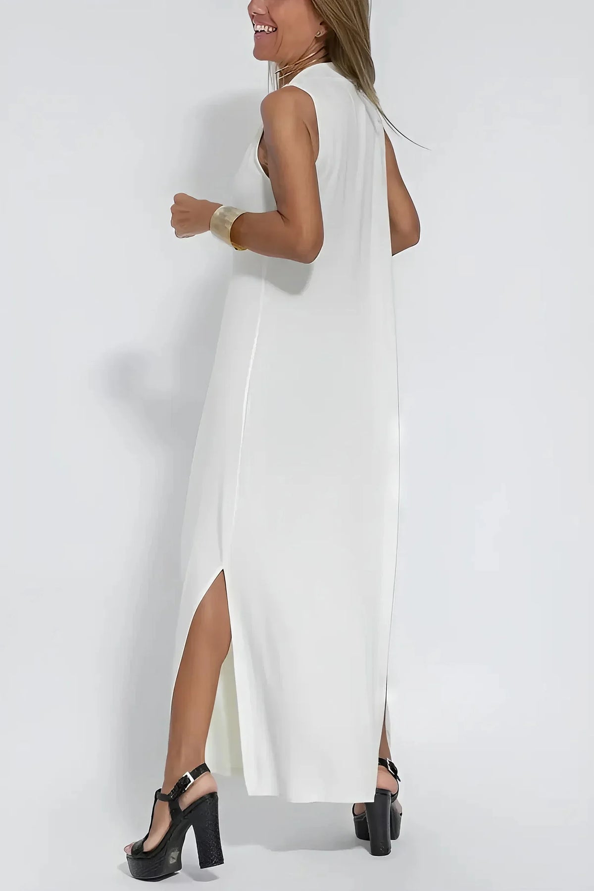 Women's knit flowy maxi dress with sleeveless V-neck and draped front
