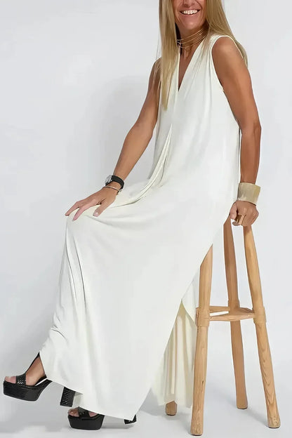 Women's knit flowy maxi dress with sleeveless V-neck and draped front