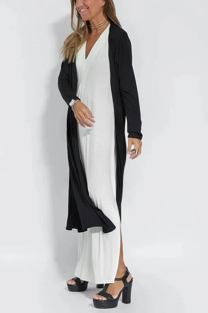 Women's knit flowy maxi dress with sleeveless V-neck and draped front