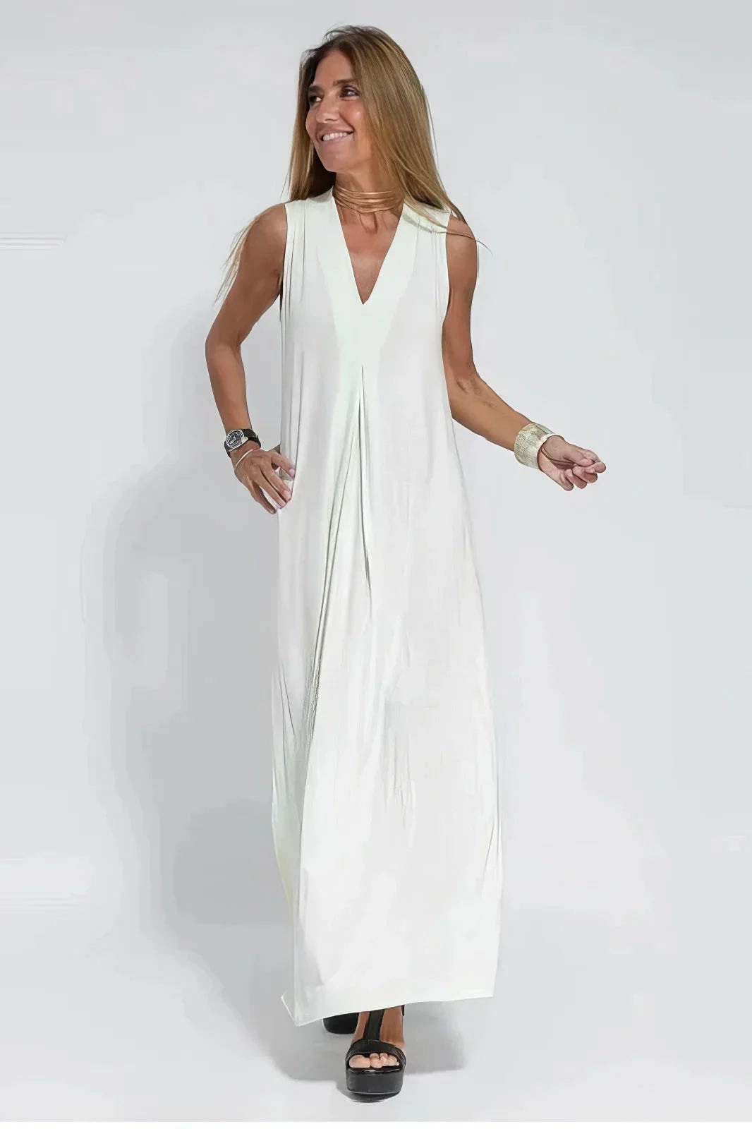Women's knit flowy maxi dress with sleeveless V-neck and draped front – White