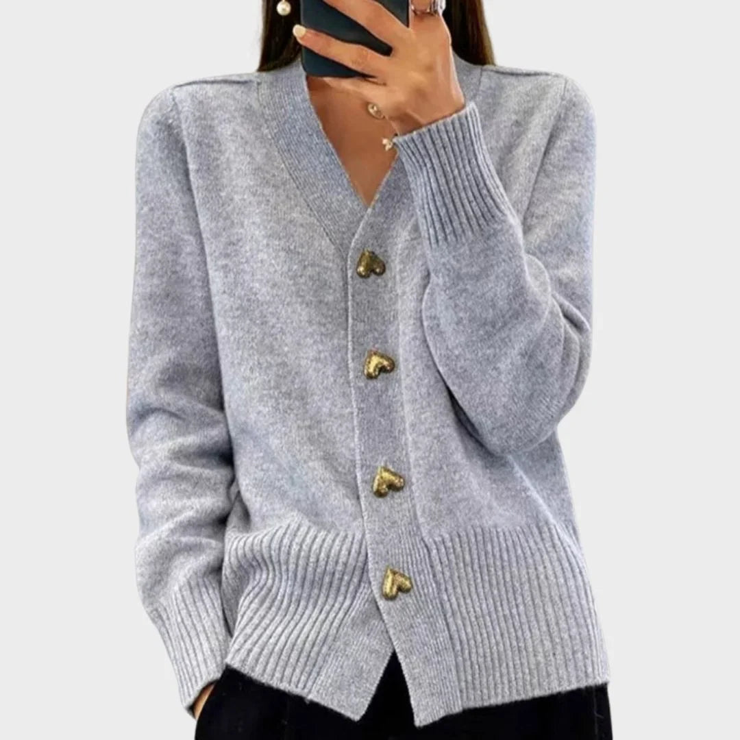 Women's knit heart-button cardigan sweater with V-neck and ribbed cuffs
