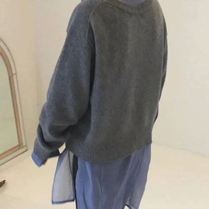 Women's knit loose-fit cardigan sweater with asymmetric button closure
