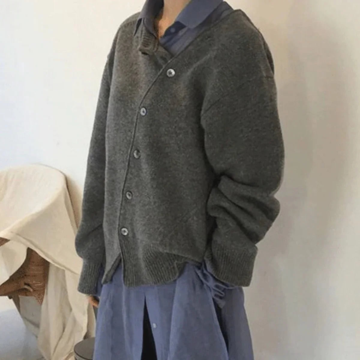 Women's knit loose-fit cardigan sweater with asymmetric button closure