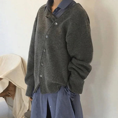 Women's knit loose-fit cardigan sweater with asymmetric button closure