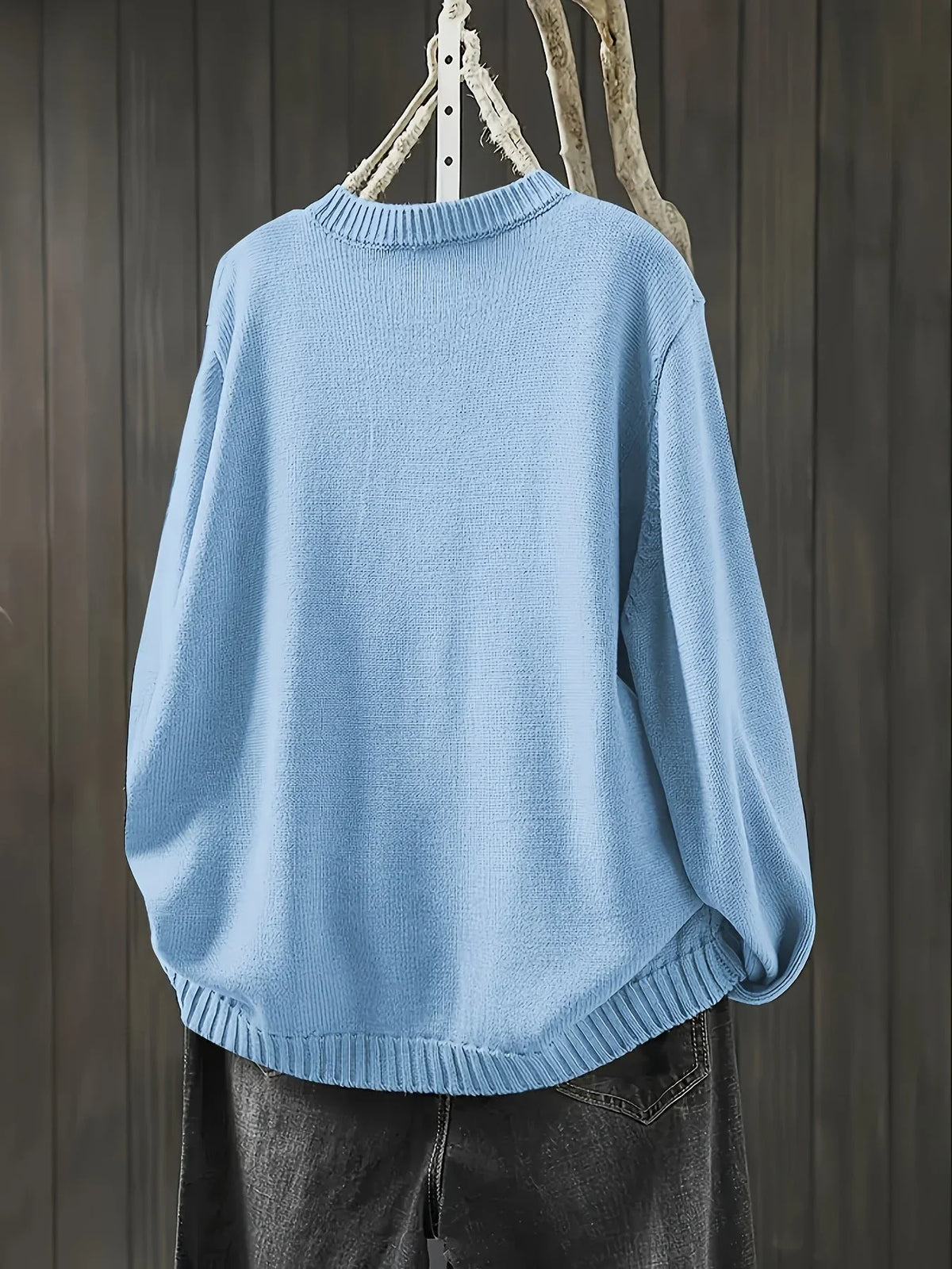 Women's knit loose-fit cardigan sweater with button-front and crew-neck