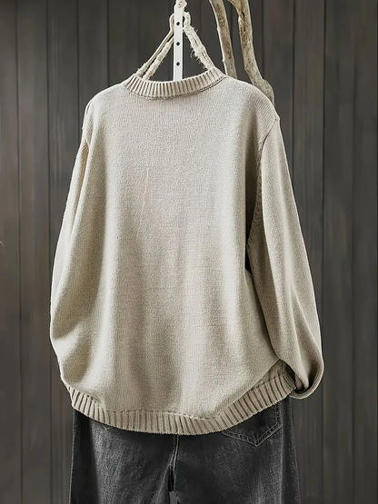 Women's knit loose-fit cardigan sweater with button-front and crew-neck