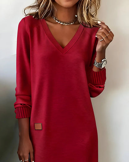 Women's knit midi dress with V-neck long sleeves and patch detail