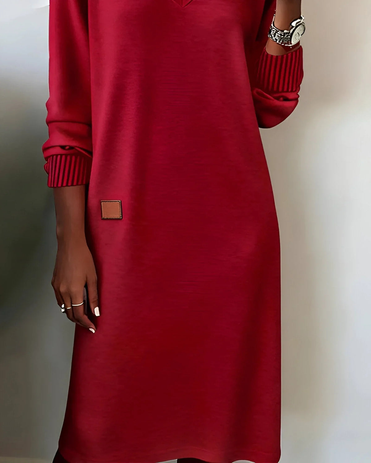 Women's knit midi dress with V-neck long sleeves and patch detail