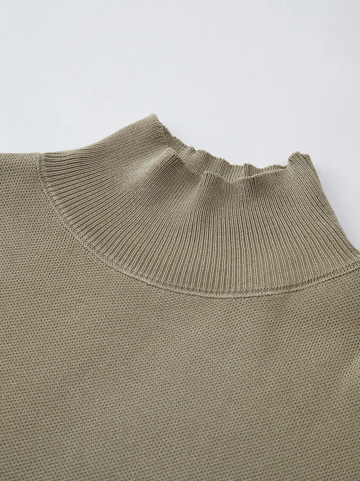 Women's knit padded-shoulder top with mock-neck and cap-sleeves