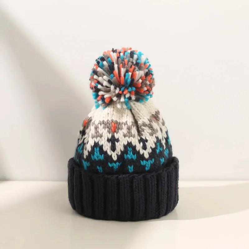 Women's knit snowflake-pattern pom-pom beanie with ribbed cuff – Navy Blue
