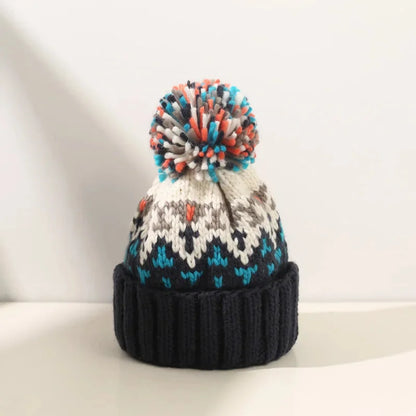 Women's knit snowflake-pattern pom-pom beanie with ribbed cuff – Navy Blue