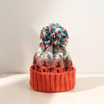 Women's knit snowflake-pattern pom-pom beanie with ribbed cuff – Orange