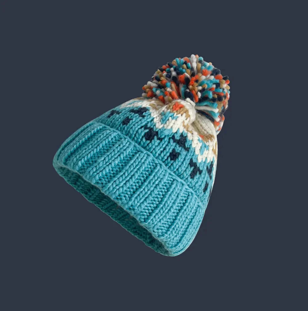 Women's knit snowflake-pattern pom-pom beanie with ribbed cuff – Sky Blue