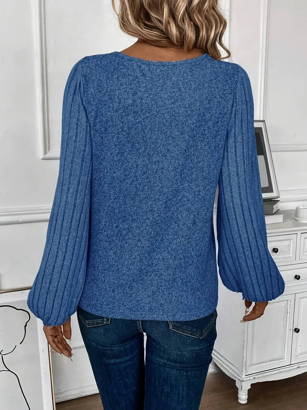 Women's knit sweater with V-neck and ribbed lantern sleeves