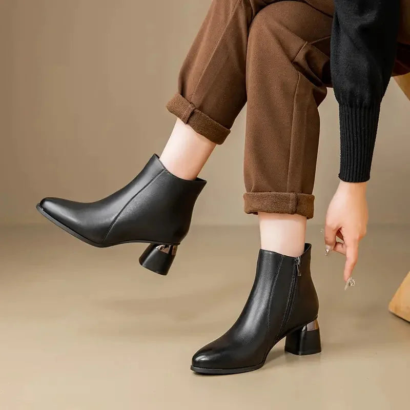 Women's leather ankle boots with pointed toe and metallic block heel