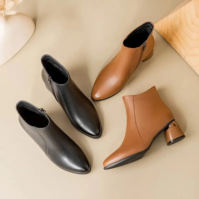 Women's leather ankle boots with pointed toe and metallic block heel