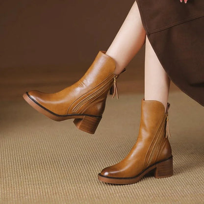 Women's leather chunky-heel ankle boots with side zipper closure