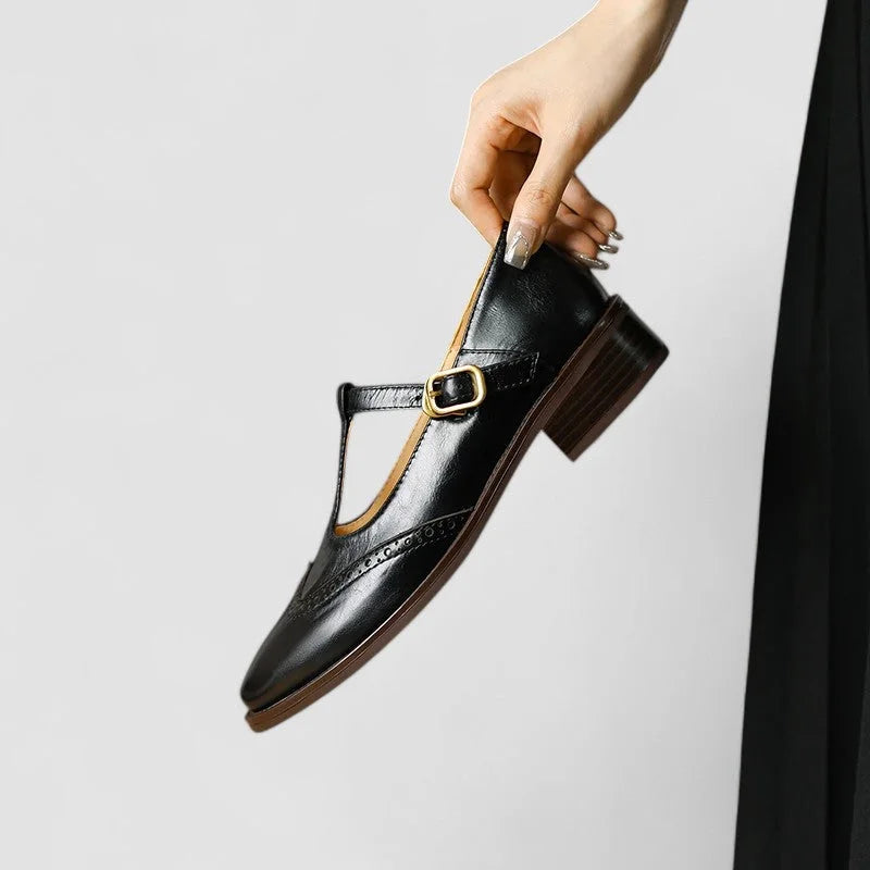 Women's leather Mary-Jane shoes with T-strap buckle and brogue detail