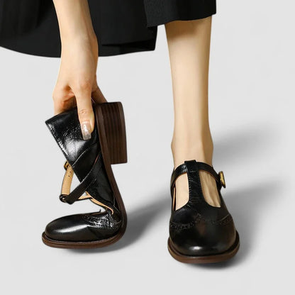 Women's leather Mary-Jane shoes with T-strap buckle and brogue detail