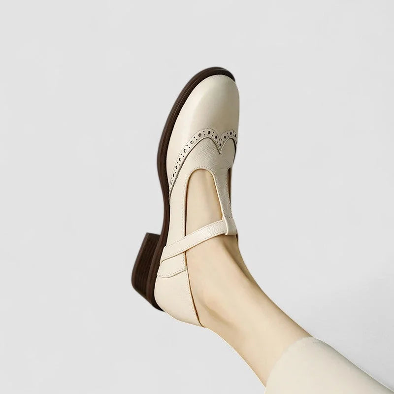 Women's leather Mary-Jane shoes with T-strap buckle and brogue detail