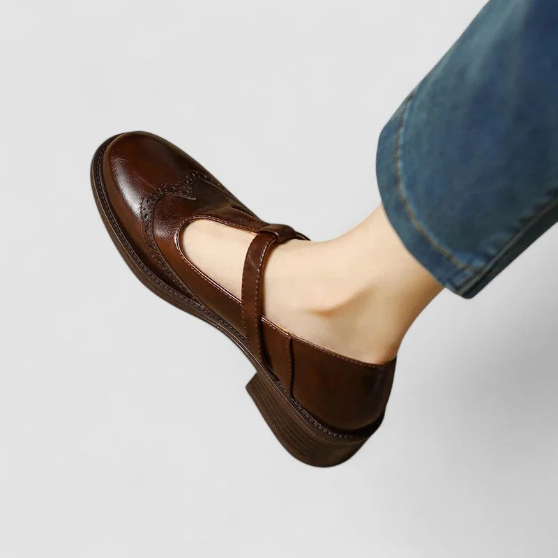 Women's leather Mary-Jane shoes with T-strap buckle and brogue detail
