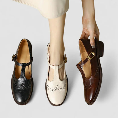 Women's leather Mary-Jane shoes with T-strap buckle and brogue detail