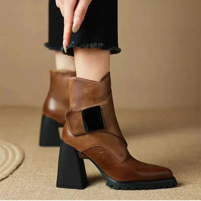 Women's leather pointed-toe chunky lug-sole ankle boots with buckle detail