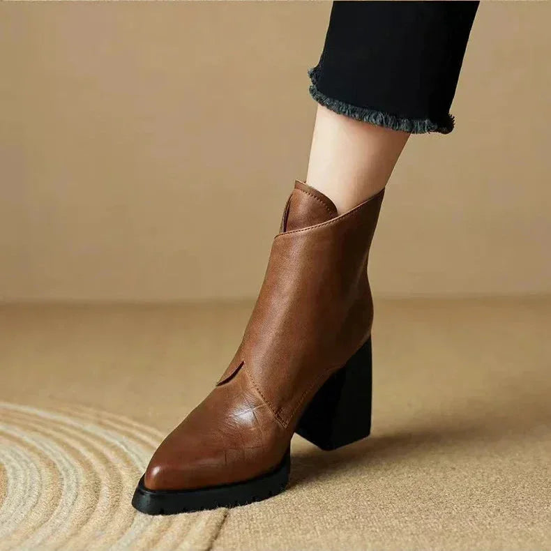 Women's leather pointed-toe chunky lug-sole ankle boots with buckle detail