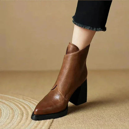 Women's leather pointed-toe chunky lug-sole ankle boots with buckle detail