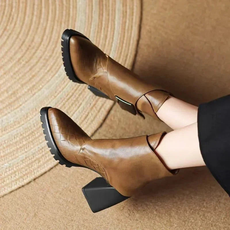 Women's leather pointed-toe chunky lug-sole ankle boots with buckle detail