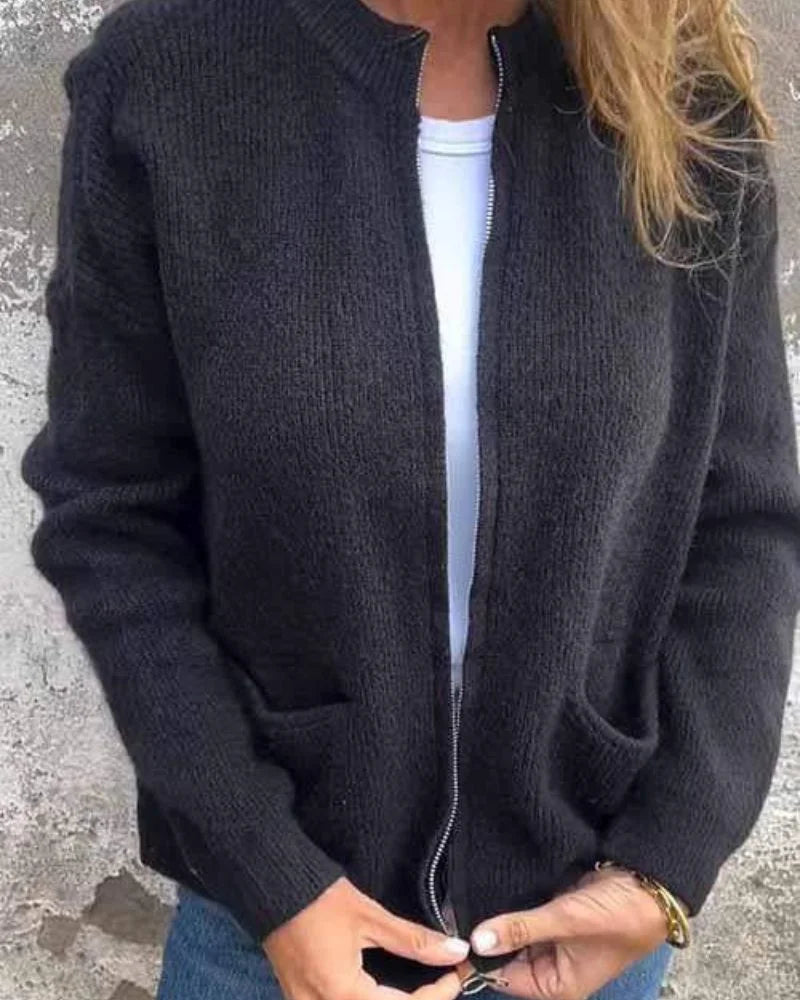 Women's long sleeve ribbed knit cardigan sweater with full-zip closure and pockets