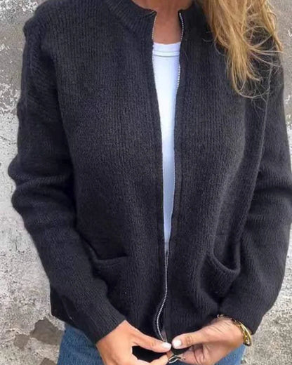 Women's long sleeve ribbed knit cardigan sweater with full-zip closure and pockets