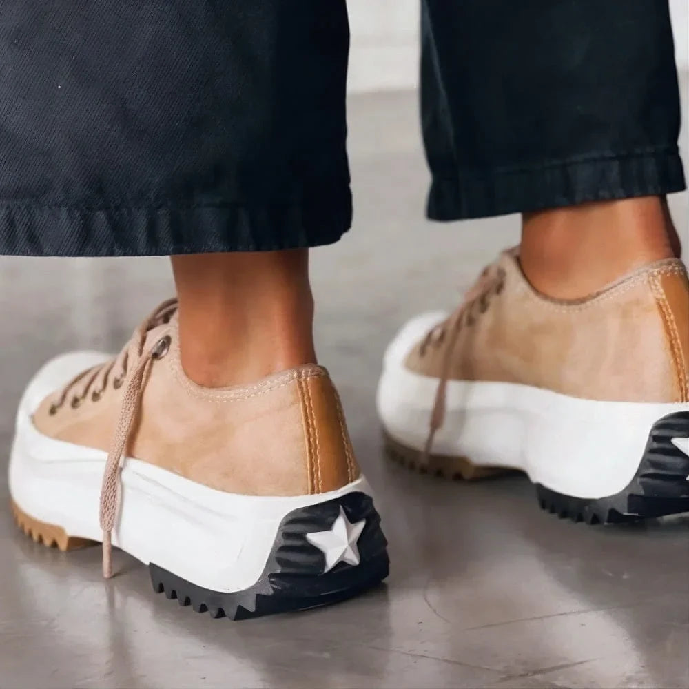 Women's low-top platform sneakers with lace-up front and chunky lugged sole