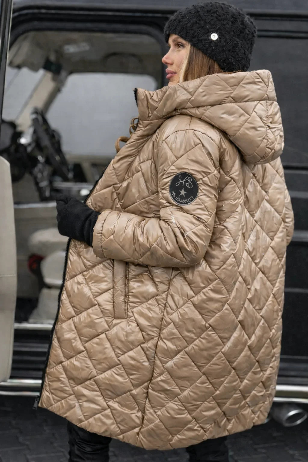 Women's metallic quilted hooded long puffer coat with zip closure