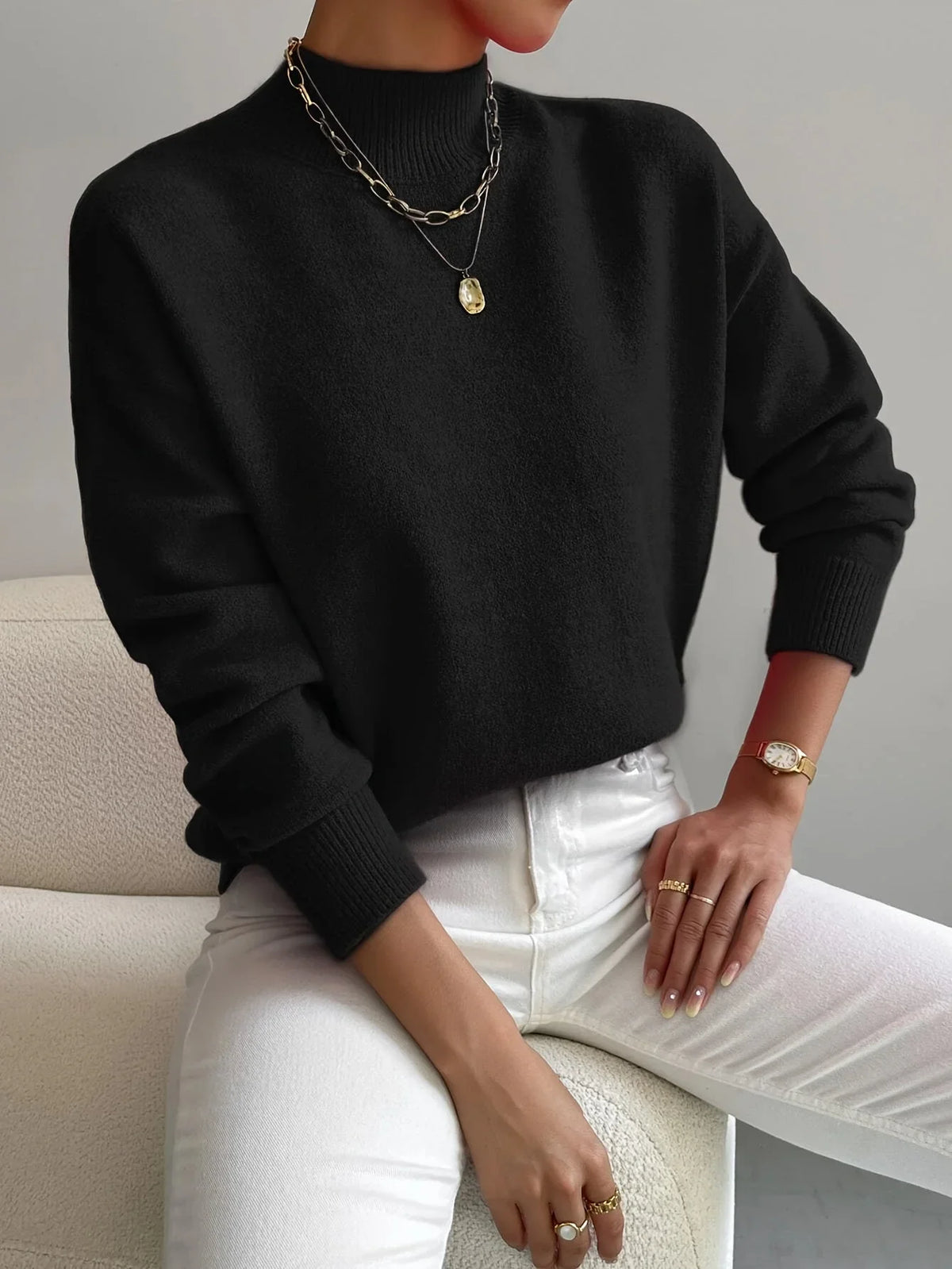 Women's mock-neck long-sleeve knit sweater with relaxed fit and ribbed cuffs – Black