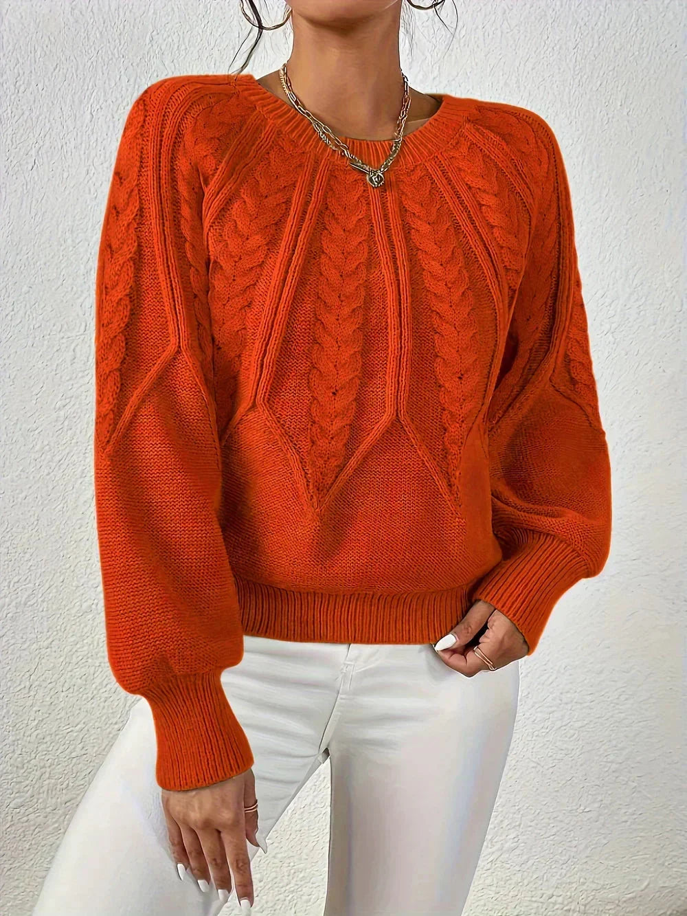 Women's modern cable knit long sleeve knit sweater with crew neck and voluminous sleeves – Orange