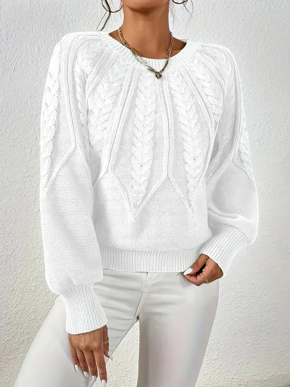 Women's modern cable knit long sleeve knit sweater with crew neck and voluminous sleeves – White